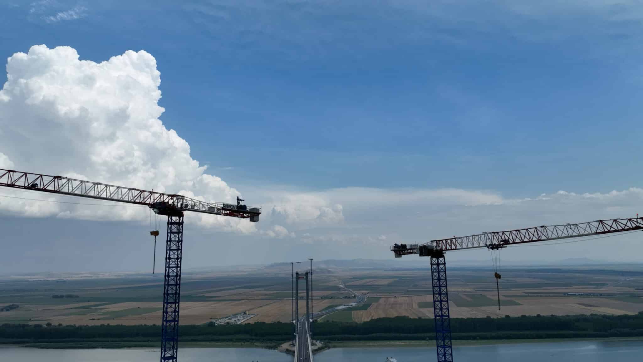 Raimondi MRT294 flat top tower cranes participate in the build of suspension bridge in Romania