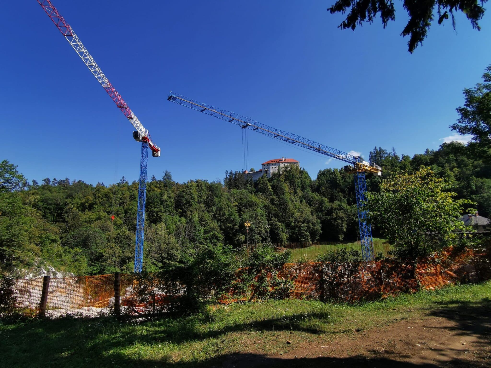 Two Raimondi flattops at work for the construction of a new museum in Bled, Slovenia